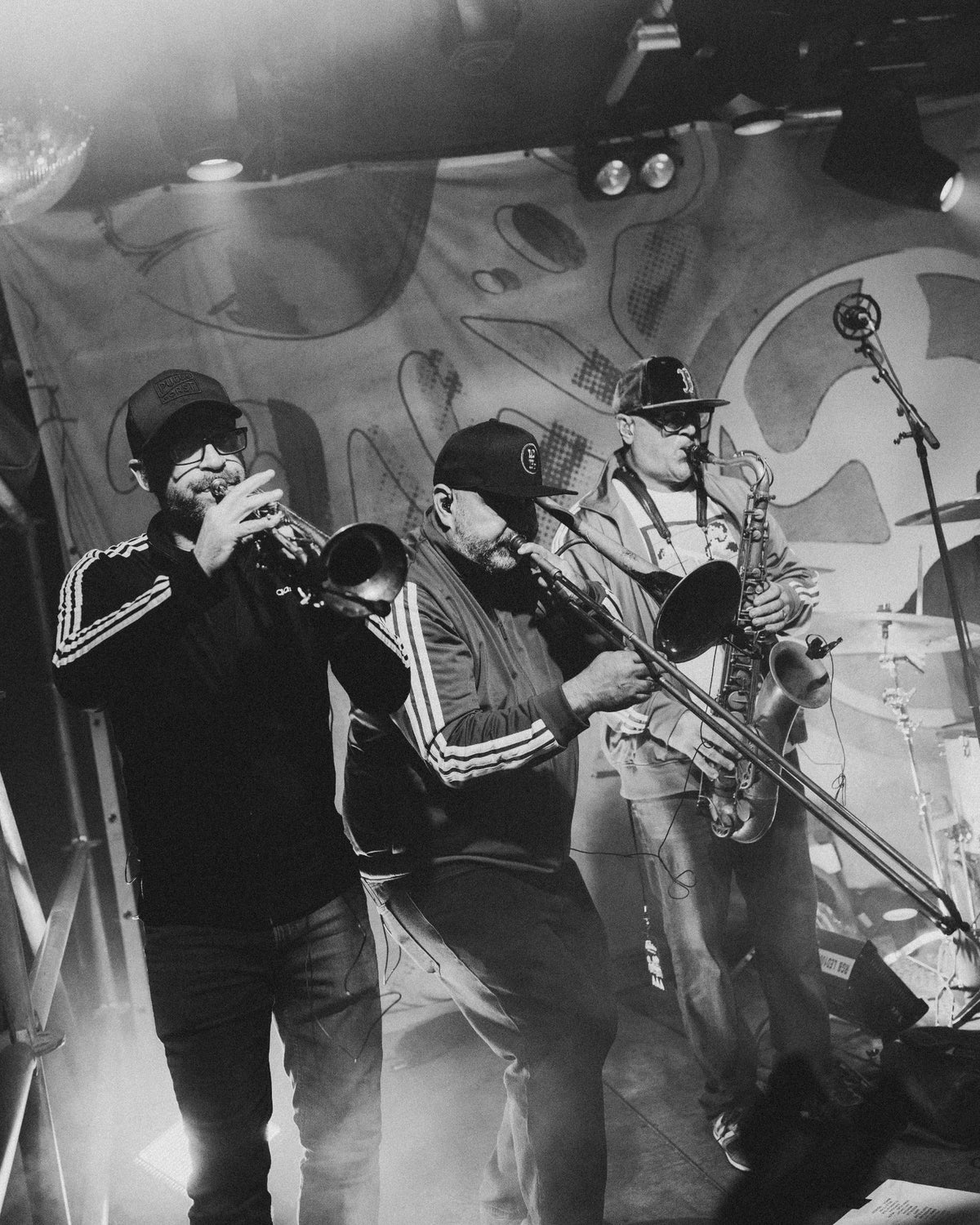 The Elovaters' horn section playing on the Backyard stage