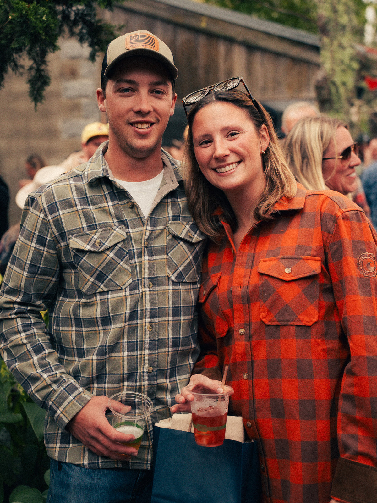 Couple in flannel smiling together at Flannel Jam Nantucket