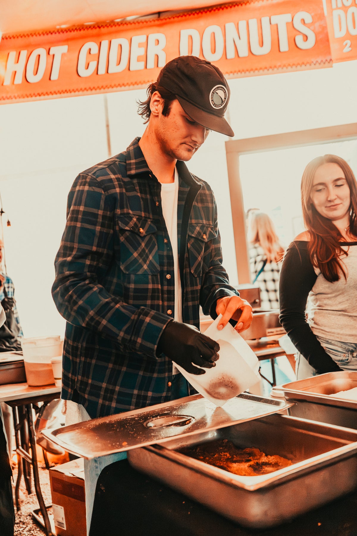 Hot cider donuts being served at the Flannel Jam food stand in Marshfield