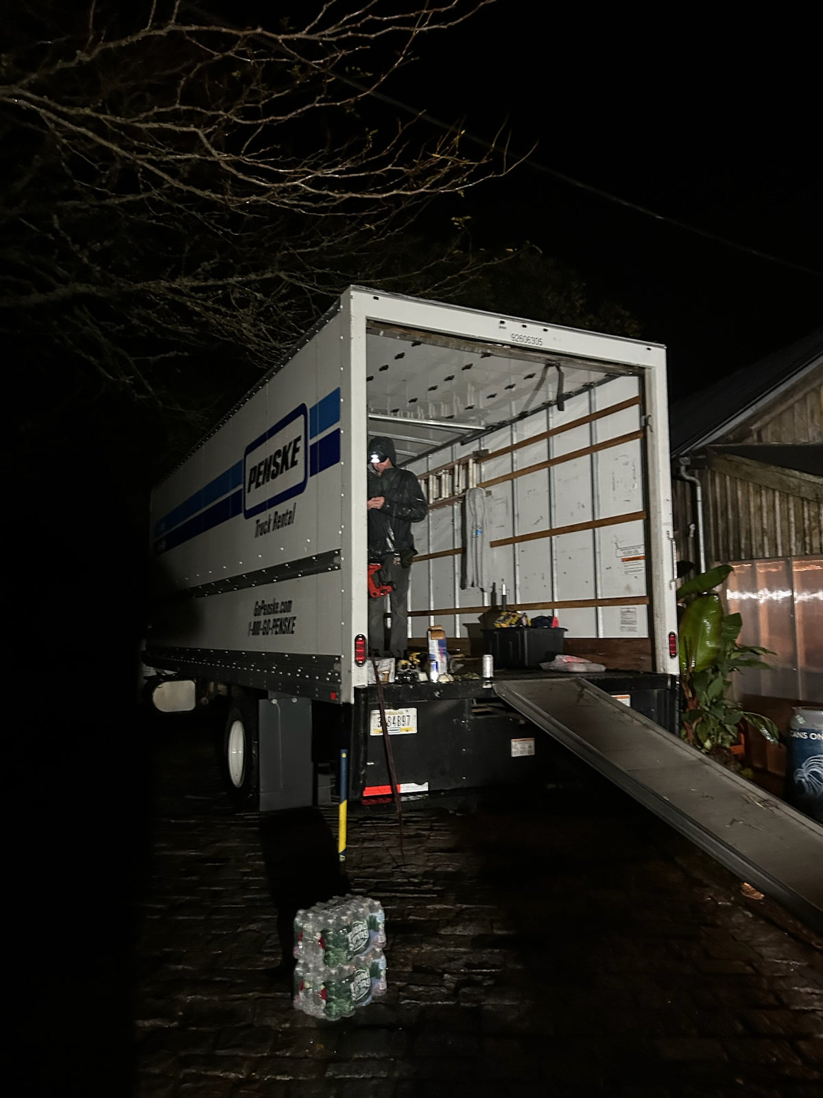 Box truck being unloaded after dark during the Flannel Jam build on Nantucket
