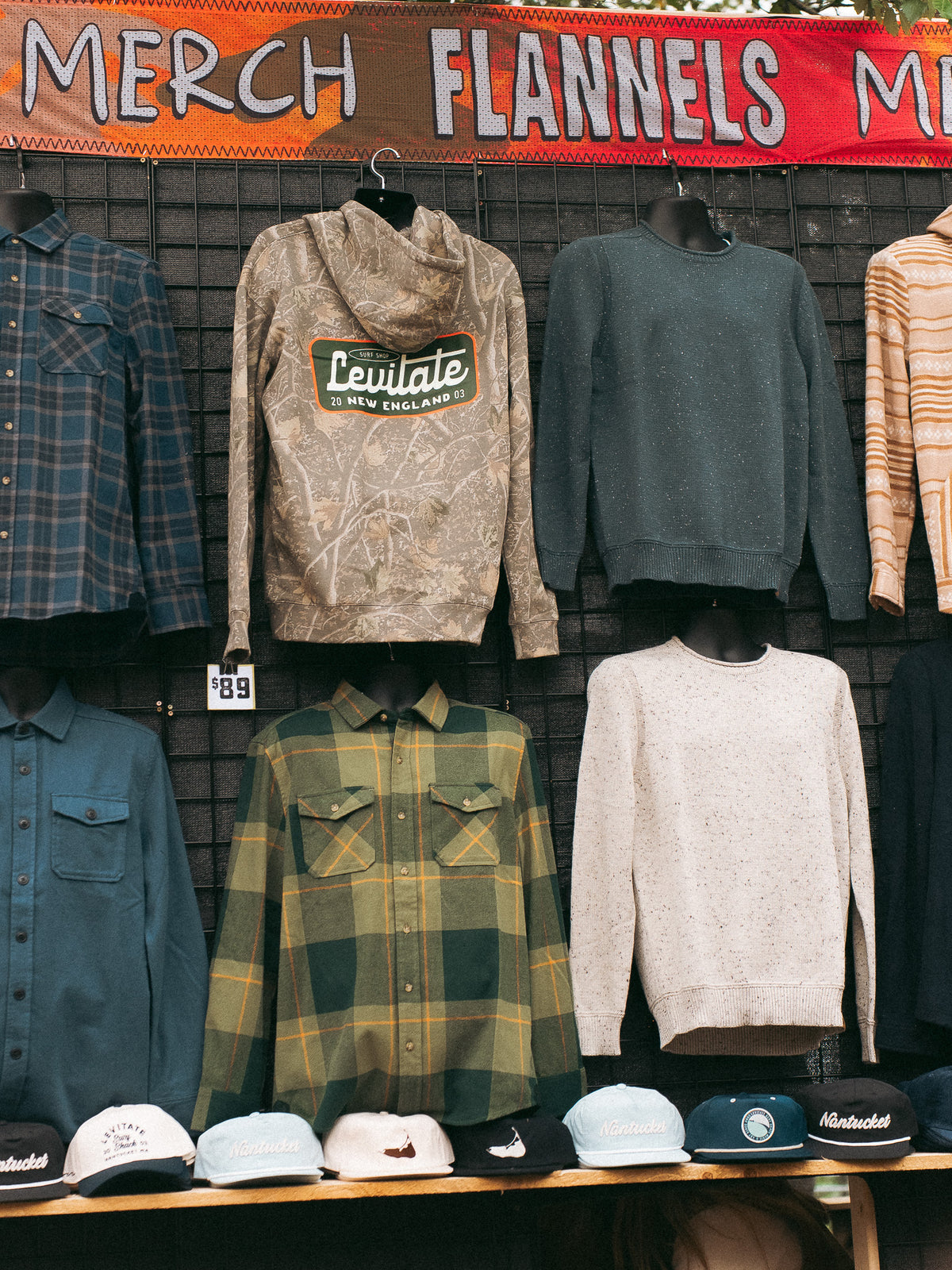Levitate flannels and fleece hanging in the Flannel Jam merch shop at Cisco Brewers on Nantucket