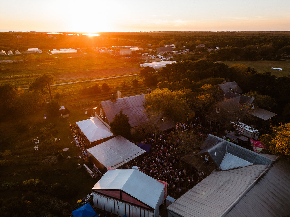 Drone view of the sun setting over Cisco Brewers on Nantucket