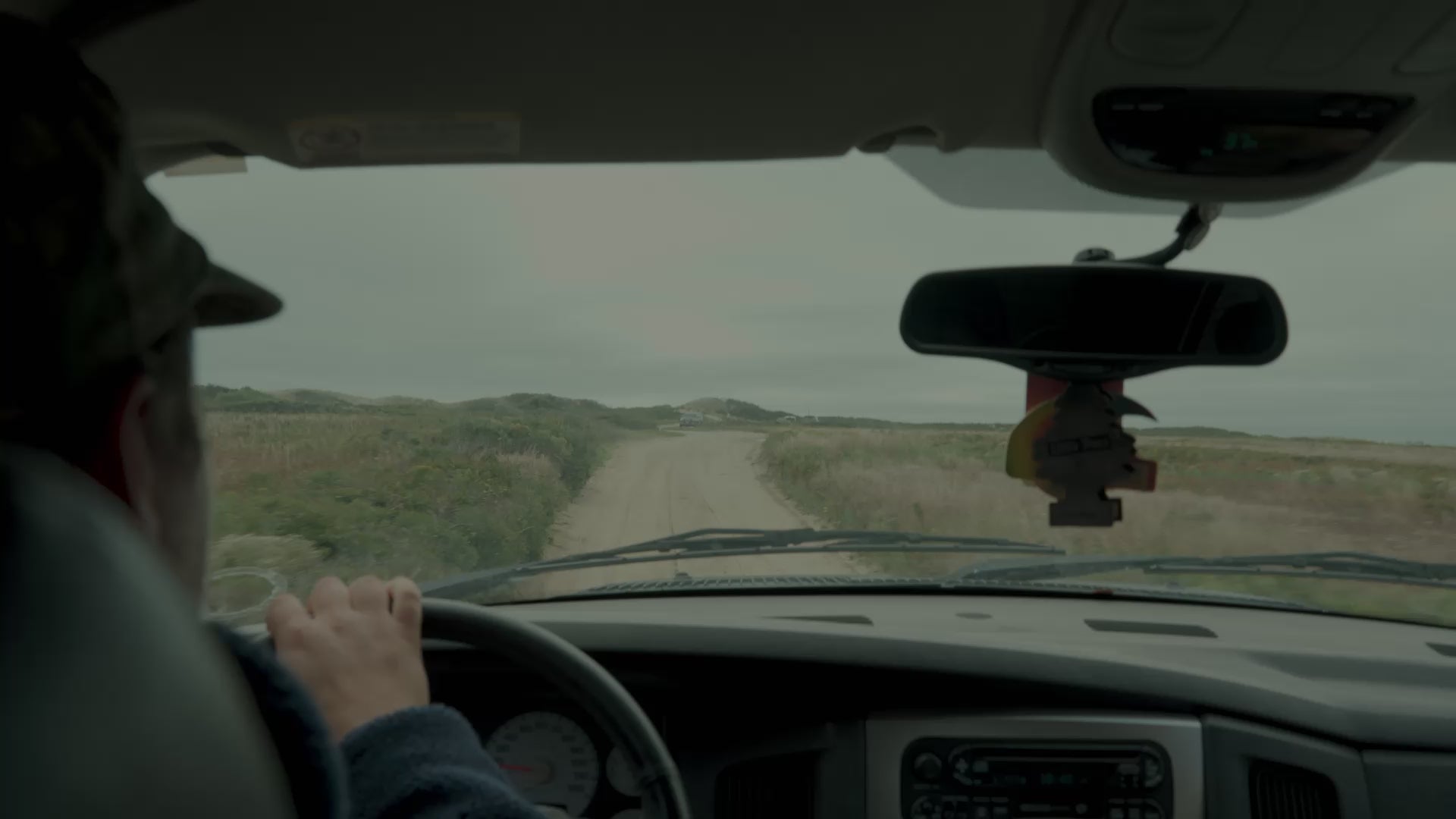 Evan Honer surfing behind Cisco on Nantucket the morning of Flannel Jam